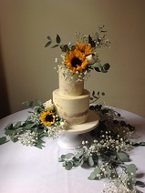 Sunflower wedding cake buttercream with sunflowers